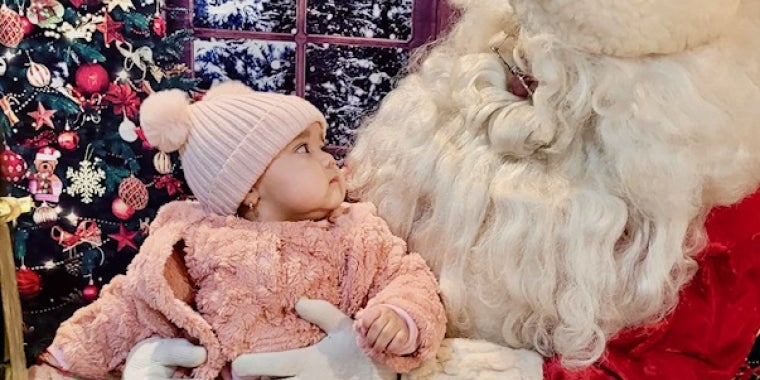  Some children looked at Santa with wonder, having seen him for the first time. 