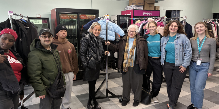 Senator Toby Ann Stavisky standing with Commonpoint staff, volunteers, and recipients at the Winter Coat Drive in Tanenbaum Family Pool, Queens.
