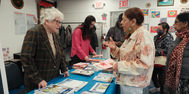 Senator Stavisky speaks with a constituent during mobile office hours.