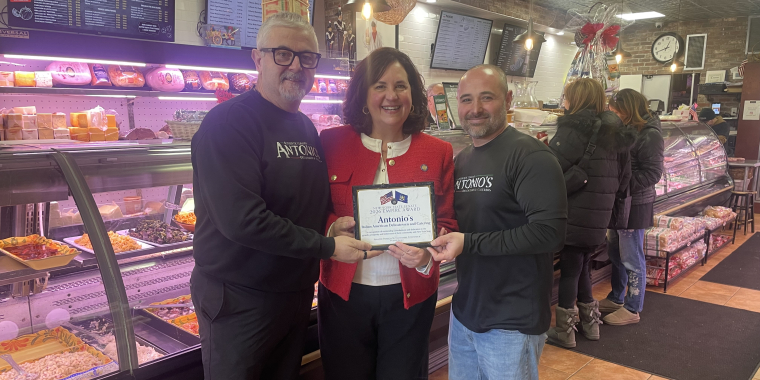 Senator Patricia Canzoneri-Fitzpatrick alongside the owners of Antonio's Deli 