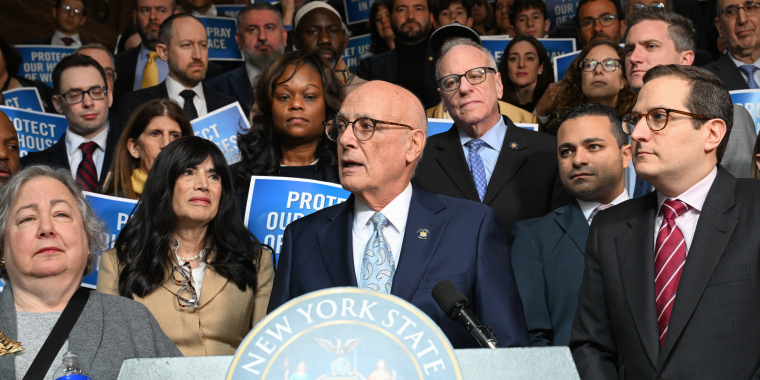 Senator Sutton speaks from the podium