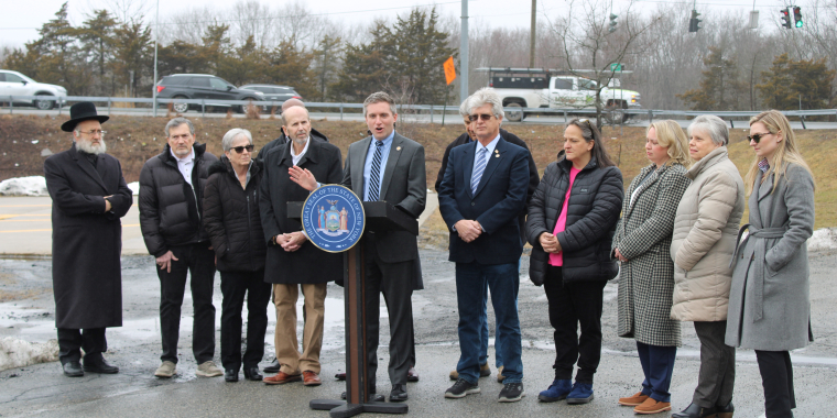 Sen. James Skoufis, joined by state and local politicians announces efforts to alleviate congestion at a busy Monroe-Woodbury intersection. 