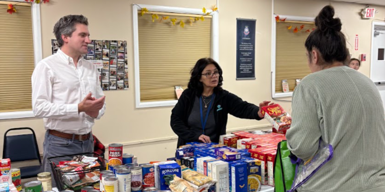 State Senator James Skoufis hands out food ahead of Thanksgiving