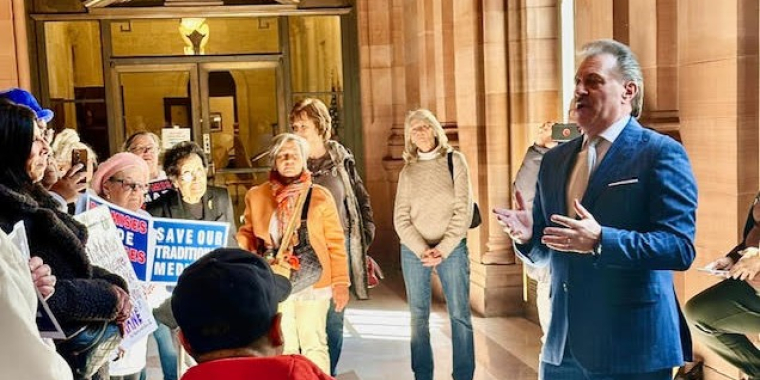 The Senator speaks at the rally.