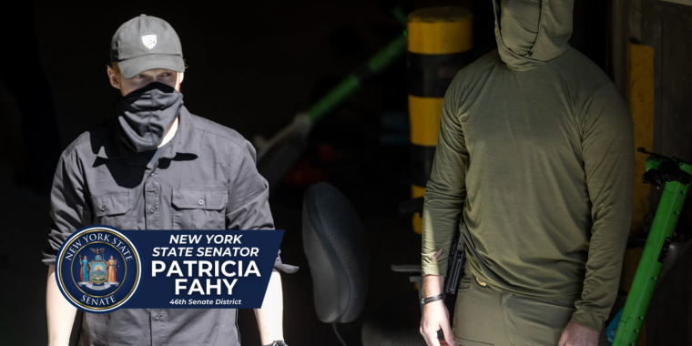 Two practically unidentifiable masked ICE agents