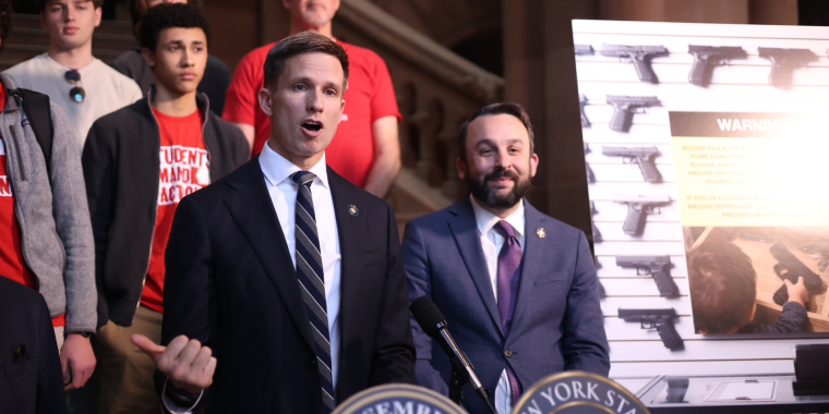 State Sen. Erik Bottcher and Assembly Member Keith Powers discuss the bill with gun safety advocates on March 10, 2026