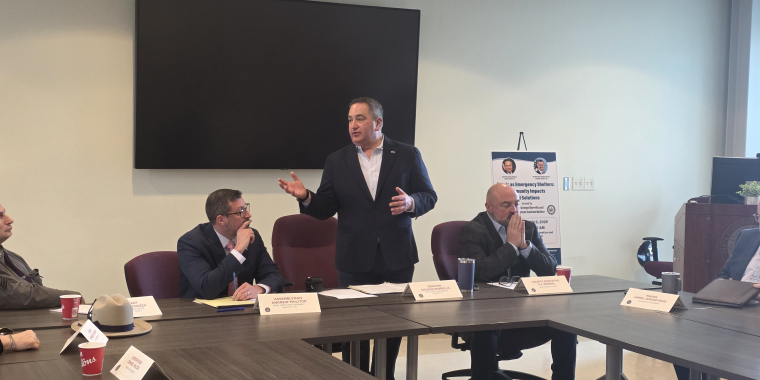 Sen Borrello speaking to a roundtable group