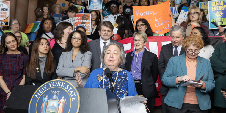 Senator Krueger speaks at a rally defending the CLCPA