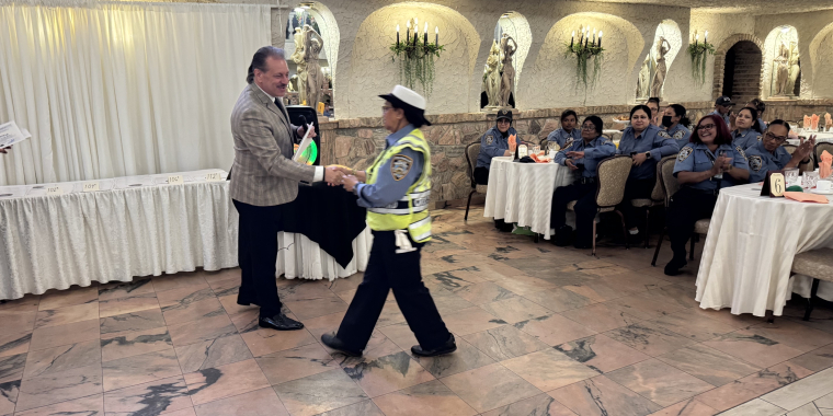 Senator Addabbo gave each crossing guard a certificate of recognition.
