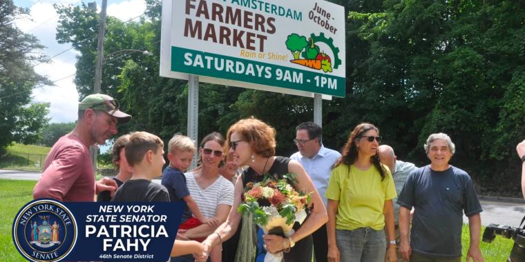 Senator Fahy with staff of the farmers market in Amsterdam
