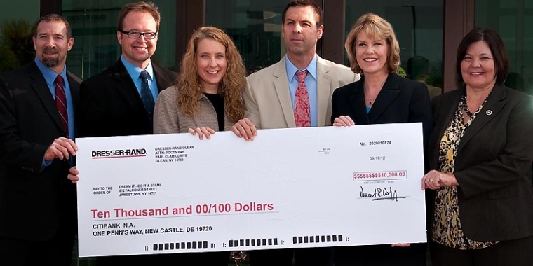 Senator Young Joins Dresser Rand As They Present A Check To Dream