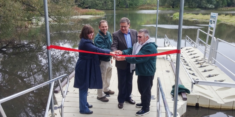 Senator Seward helps officially dedicate the new universally accessible cartop boat launch site along the Susquehanna River in Portlandville. From left, Otsego County Conservation Association Executive Director Darla Youngs, DEC Operations Supervisor Brian Layman, Senator James Seward, Goodyear Lake Association President Dave Pickup.