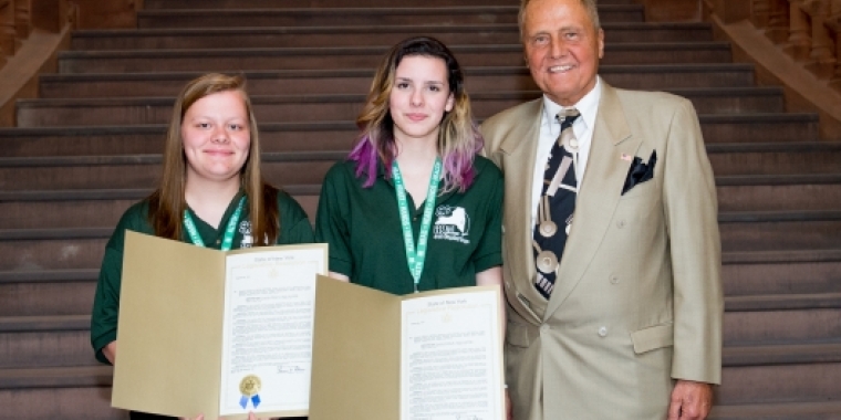 Senator Bonacic is pictured with (L-R) Raina Howe and Emily Richards.