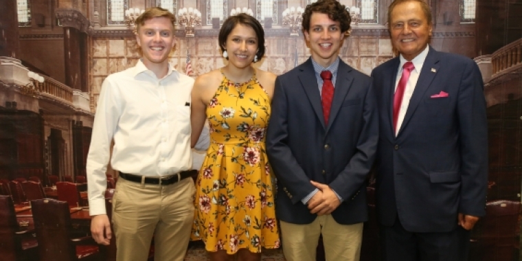 Senator Bonacic is pictured with (L-R); Valedictorian, John Vickers; Honored Student Emily Kollig; and Salutatorian, John Hultenius.