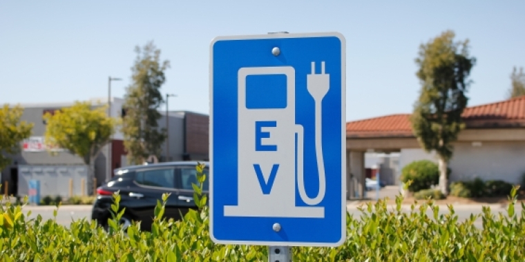 Sign showing electric vehicle charging station
