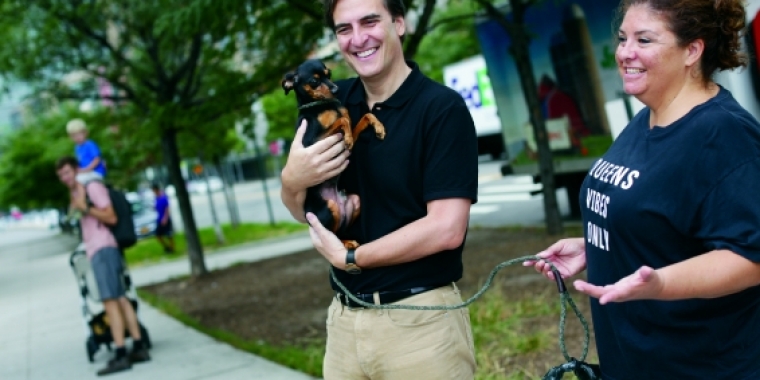 Senator Gianaris with a dog. 