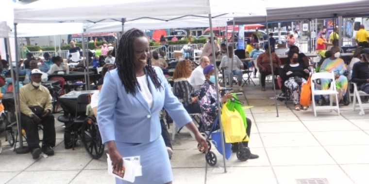 Senator Cleare in Front of Crowd of Seniors