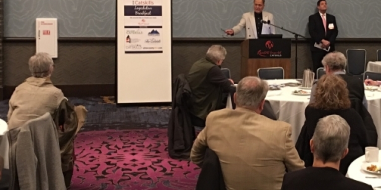 Senator Bonacic delivers remarks at the Catskill Regional Annual Legislative Breakfast. To the right of Senator Bonacic is Mark Dorr, Executive Director of the New York State Hospitality and Tourism Association.