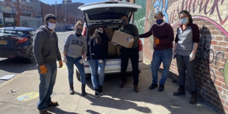 Team Salazar Loading Food Boxes For Distribution