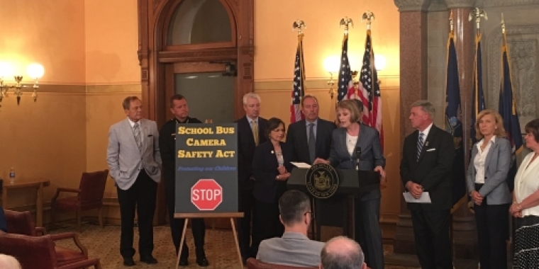 Senator Bonacic (far left) is pictured at a press conference in support of the School Bus Camera Safety Act.