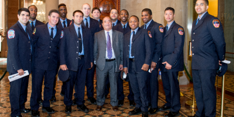 Senator Dilan meets outside the Senate Chambers with member of the New York City Fire Department.