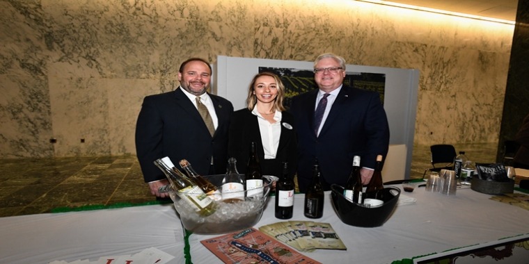 In the photo above at this year’s Sip and Sample, from left to right: Assemblyman Palmesano, Erica Paolicelli (NYWIA President and Co-owner of Three Brothers Wineries & Estates in Geneva), and Senator O’Mara. In the photo above at this year’s Sip and Sample, from left to right: Assemblyman Palmesano, Erica Paolicelli (NYWIA President and Co-owner of Three Brothers Wineries & Estates in Geneva), and Senator O’Mara.