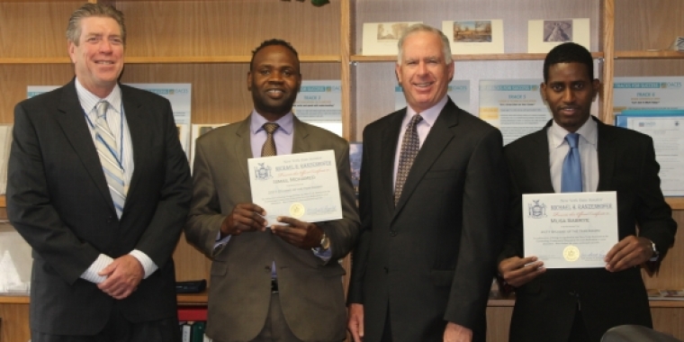 Senator Ranzenhofer presents official Senate certificates of recognition to award recipients.