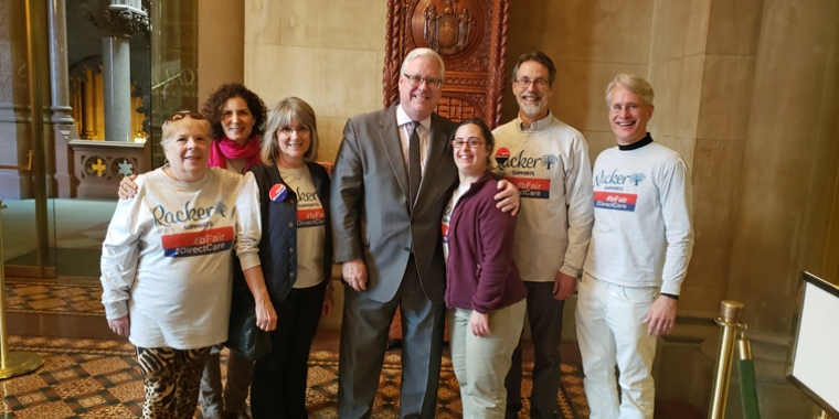 In the photo above at the State Capitol, from left to right: Karla Kesel (Direct Support Professional), Nancy Corwin Malina (President, Board of Directors), Perri LoPinto (Director of Donor & Government Relations), Senator O’Mara, Annie Joyce, Lanny Joyce, and Dan Brown (Executive Director).