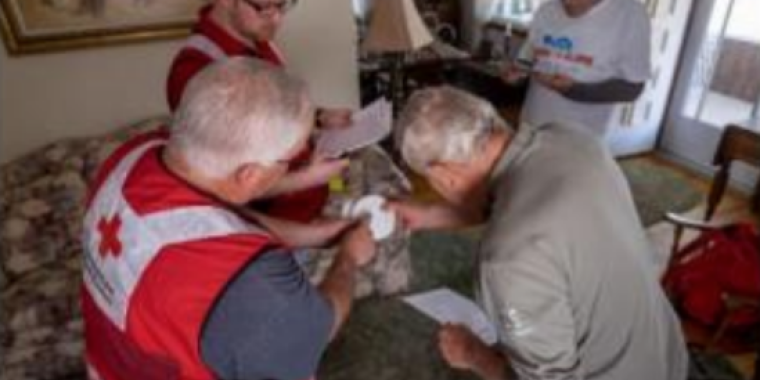 American Red Cross staff show homeowners how to prepare their home for fire safety.