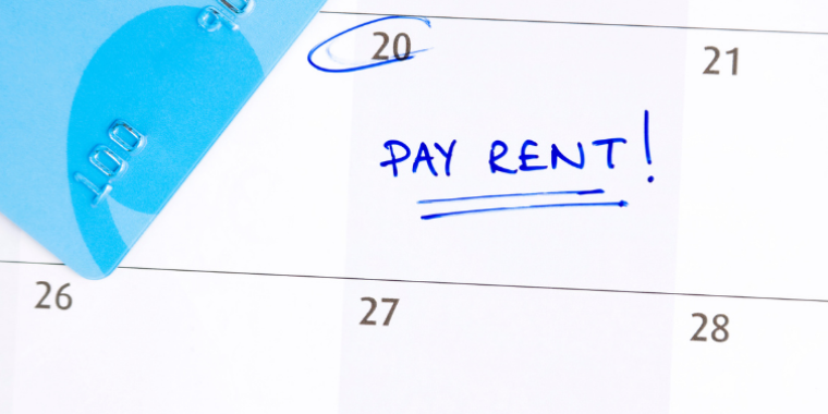 Photo of "pay rent" written on calendar