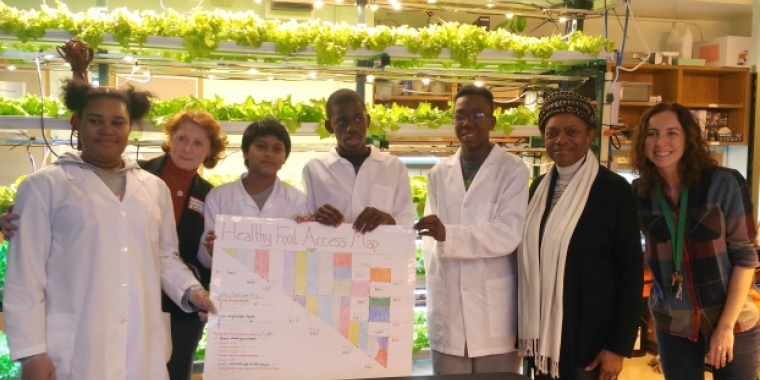 Students from the Unison School give Senator Montgomery and Assemblywoman Simon a tour of their hydroponic farm as part of Community Education Council District 13 Presidents' Council Legislative Breakfast