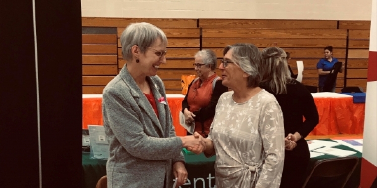 Senator May Shaking Hands