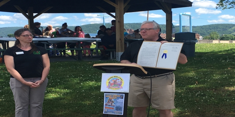 Senator O'Mara presents a Legislative Resolution recognizing "Nurturing Community Day" in Chemung County.
