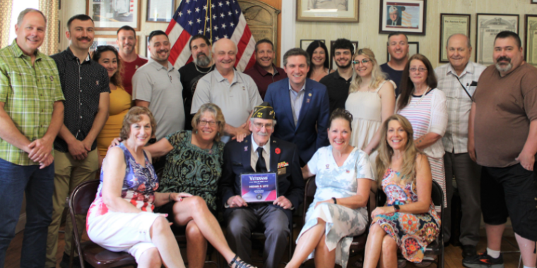 Veteran Michael Lutz (center front) poses with his extended family and Senator James Skoufis (2nd row center)