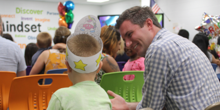 Senator James Skoufis congratulates a Chester UPK student on completing their school year.