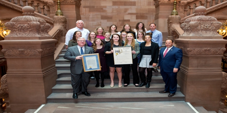 Senator O’Mara and Assemblyman Palmesano are shown with the team and coaches in the State Capitol prior to the team’s recognition during the Senate and Assembly sessions.