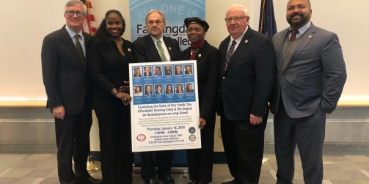 Senators and Assemblymembers pose with the president of SUNY Farmingdale