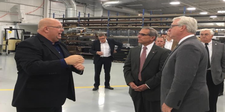 Senator O'Mara and Chemung County Executive Tom Santulli tour and discuss the new facility with Site Manager J. Patrick Ervin.