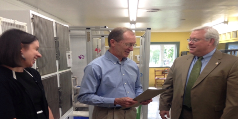 Senator O'Mara presents an official Legislative Resolution honoring the 125th Anniversary of the Chemung County SPCA to Executive Director Tom Geroy.
