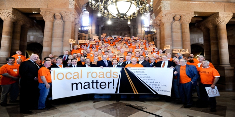 Legislators and advocates gathered in the State Capitol for last year's "Local Roads Matter" rally.