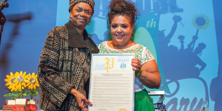 Senator Montgomery presents proclamation to Elizabeth Yeampierre, Executive Director of UPROSE. Photo courtesy of Brooklyn Reader.