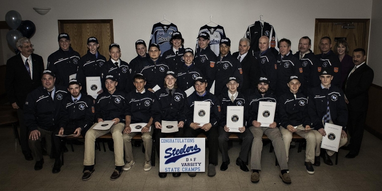 Senator Cathy Young, City of Dunkirk Mayor Willie Rosas, and Assemblyman Andy Goodell honor the Dunkirk-Fredonia Steelers varsity hockey team on its state championship.