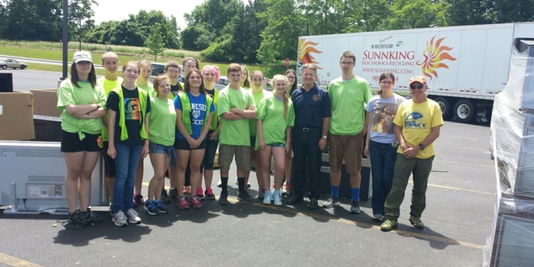 Senator Gallivan joins volunteers at last year's electronic recycling event at Geneseo High School.