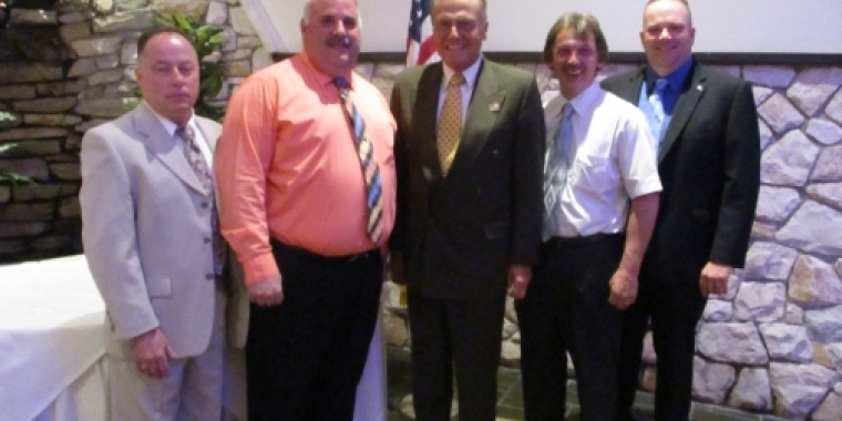 Senator Bonacic is pictured with (L-R), First Assistant Chief Don Luis, Chief of Department Sam Barone. Second Assistant Chief Nick Barber, and Third Assistant Chief Robert Brady.