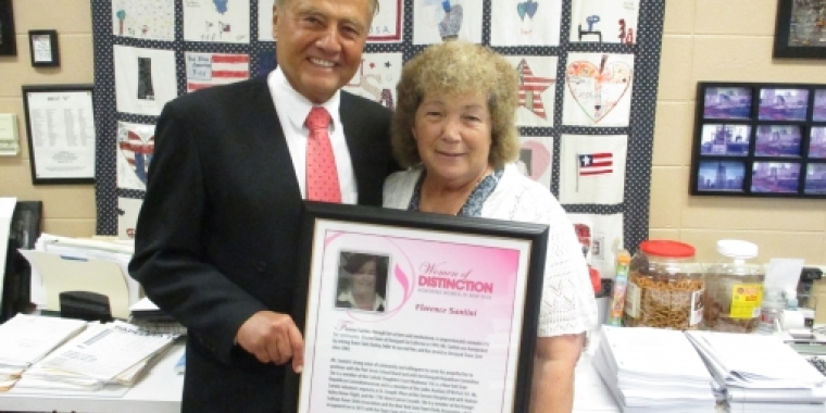 Senator Bonacic presents Florence Santini with a ceremonial plaque from the 2016 Woman of Distinction Ceremony.