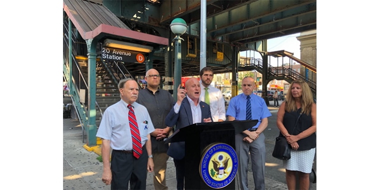“Our subways are melting down,” said U.S. Rep. Max Rose (at podium). Also speaking out on the need for government investments in transit services are Assemblymember William Colton, Councilmember Justin Brannan, state Sen. Andrew Gounardes, Councilmember Mark Treyger and Community Board 11 District Manager Marnee Elias-Pavia (left to right).
