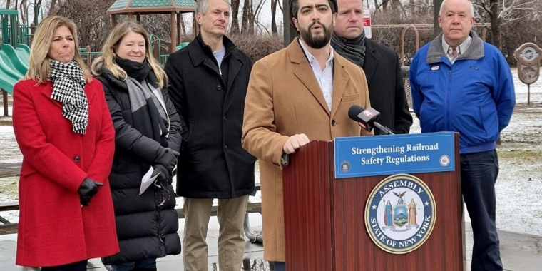 Assemblymember Jon D. Rivera addresses the media at Raymond Park, near a Norfolk Southern rail line, March 4, 2023 (Photo Credit: Ben Tsujimoto/The Buffalo News)