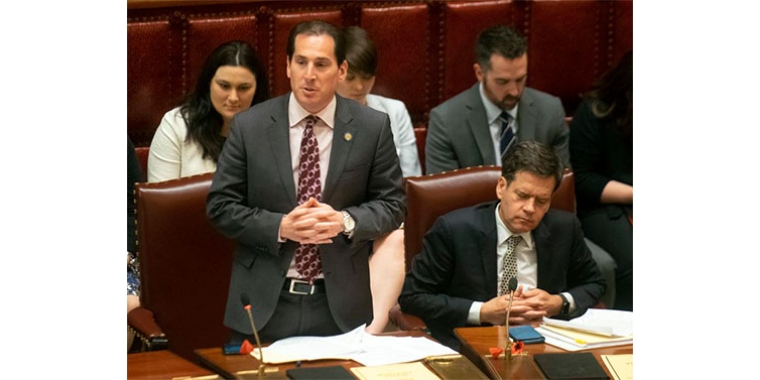 State Sen. Todd Kaminsky, D-Long Island, speaks on the Senate floor at the Capitol in Albany, N.Y. (Tim Roske/AP)