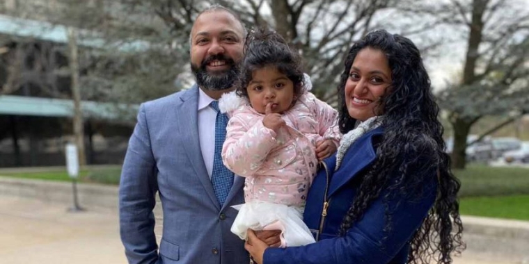 Kevin Thomas with his wife Rincy and their daughter Layla.