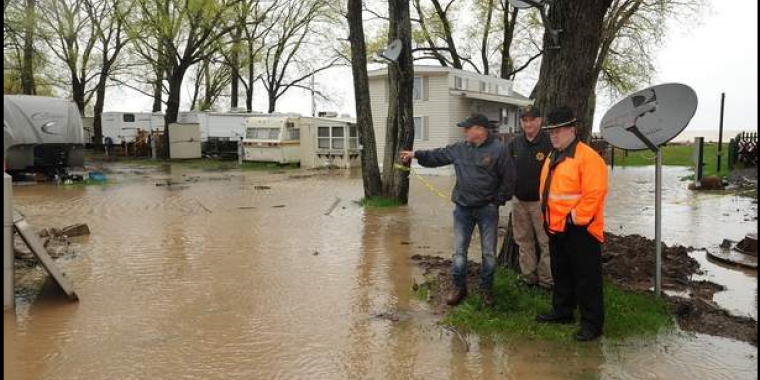 Rocco Laurienzo/The Daily NewsAssemblyman Steve Hawley looks over flood and erosion damage at Green Harbor Marina and Campground where damage and flooding is quite significant.